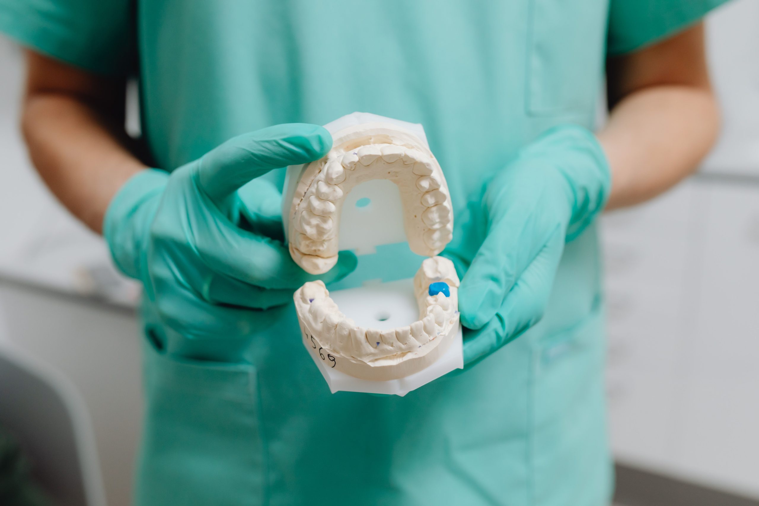 Dentist using digital scanning technology to design a same-day crown